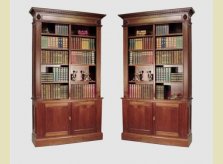 George III style open bookcases on cupboard bases